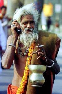 Kumbh sadhu with mobile phone